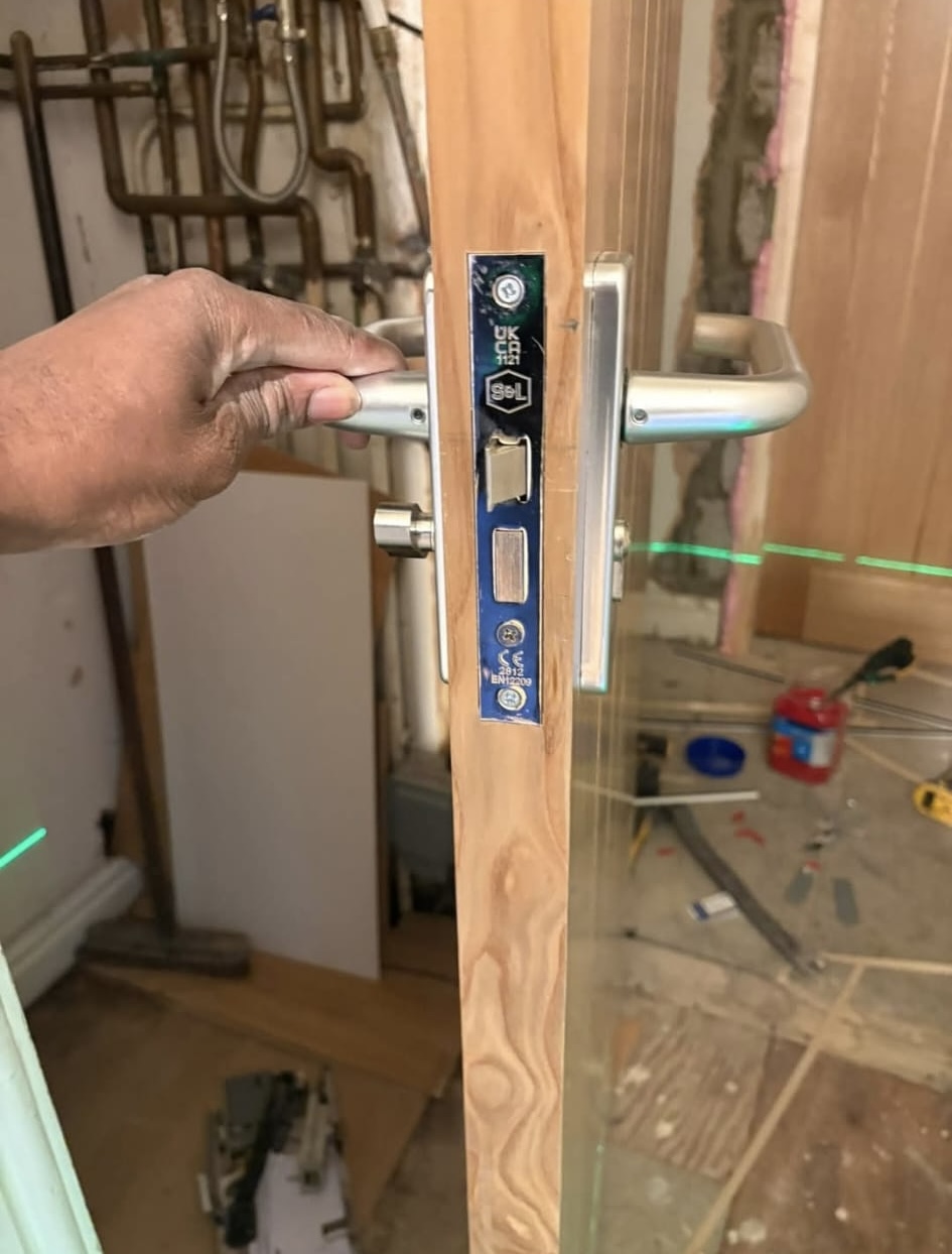Close-up of hardware and lock fitting on a timber door