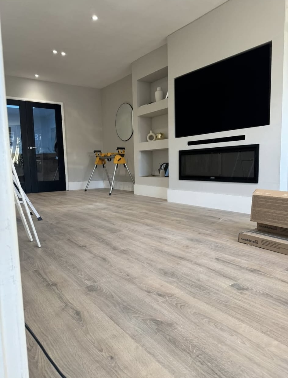 Large living room media wall installation nearing completion