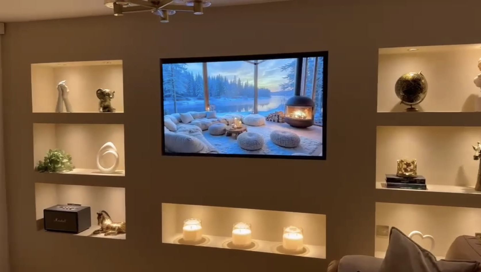 Finished media wall with shelves and decorative styling